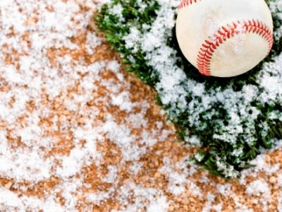 Baseball on field with snow