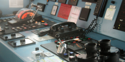 User Interface Displays On Blue Colored Ship With Black Controls