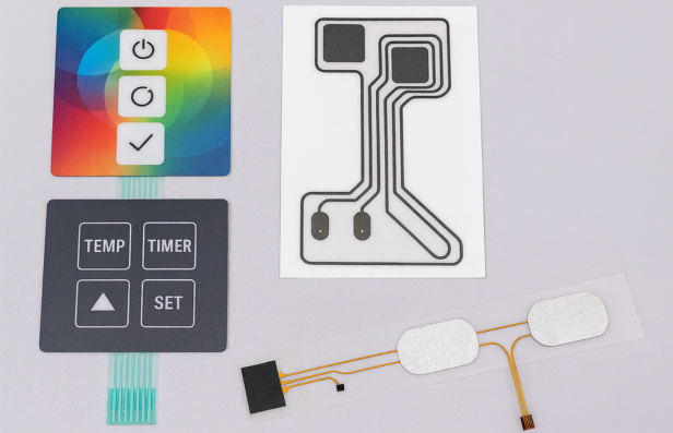 Printed electronics with overlays and circuits