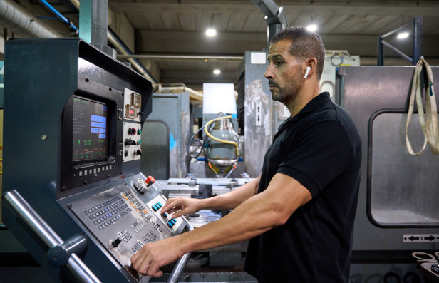 Technician operating modular overlay industrial interface